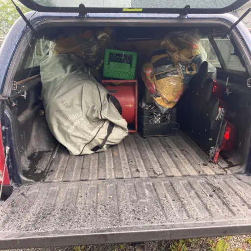 Half a truck full of firefighting gear.