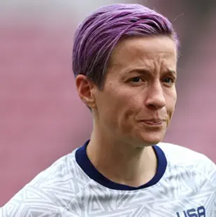 Megan Rapinoe with her signature purple hair.