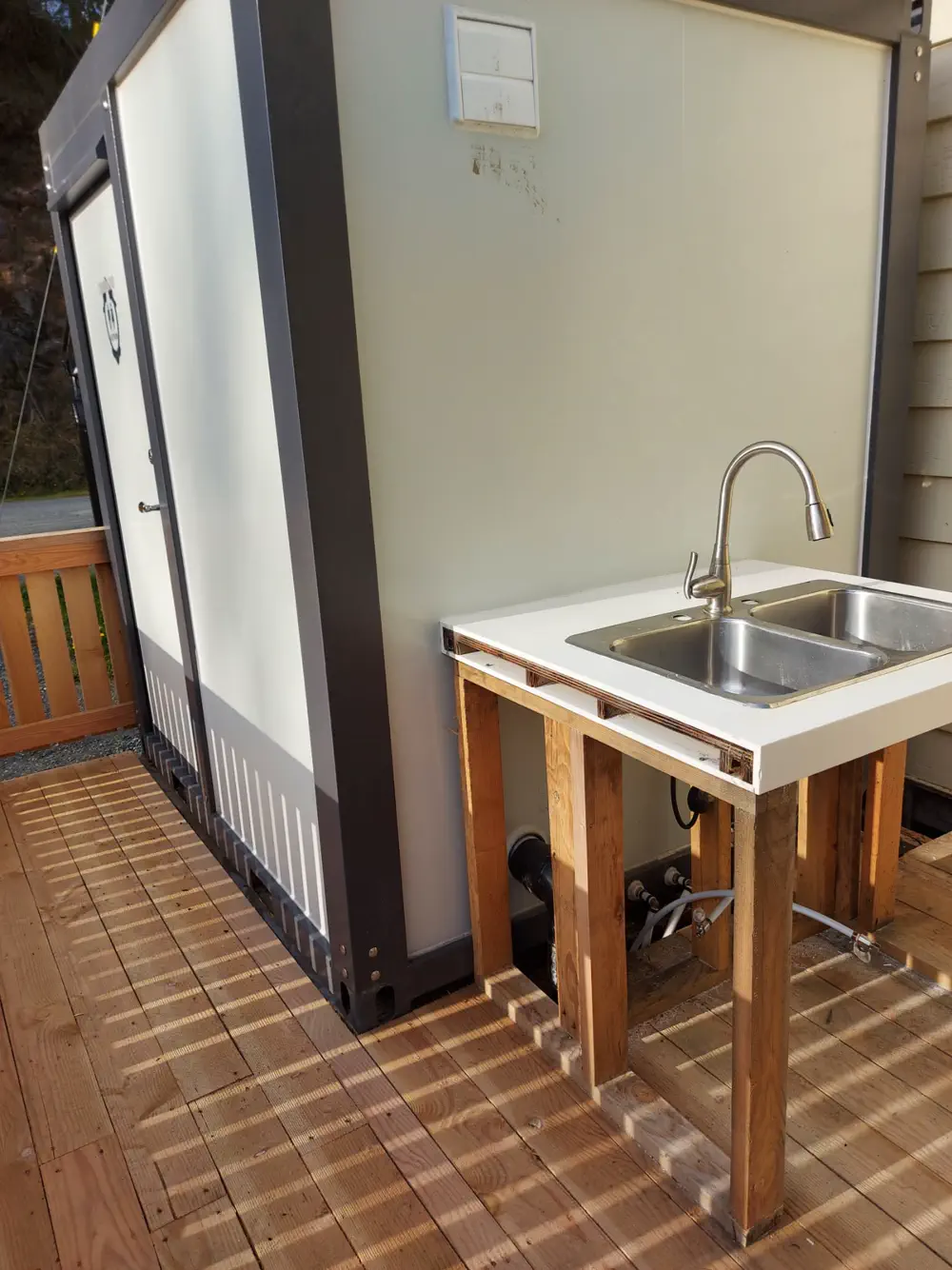 A shot of the outdoor washrooms at the Scarlet Ibis, where you can wash up after a long trek.