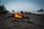 Close up photography of bonfire on beach sand