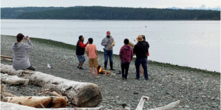 Drummers at ceremony surprised by orcas