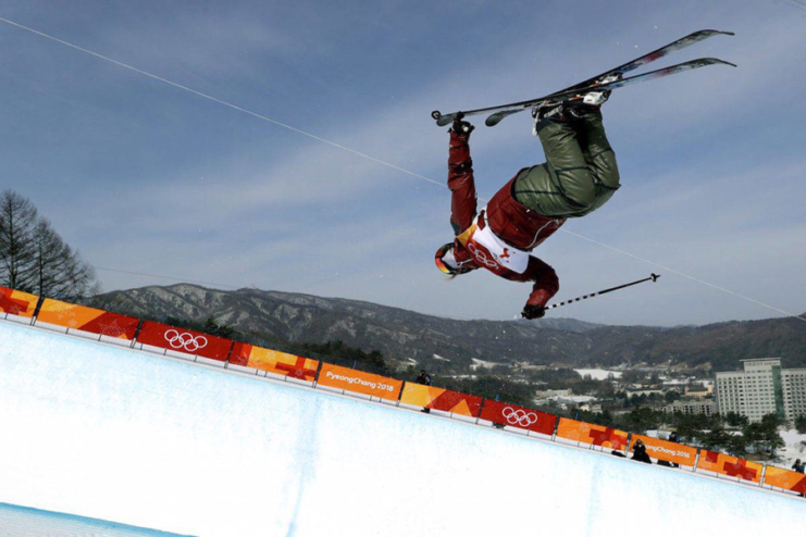 Cassie Sharpe doing tricks in her skiis at the 2018 Winter Olympics.