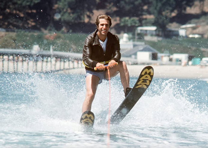 The Fonz from Happy Days on waterskis and wearing a leather jacket.
