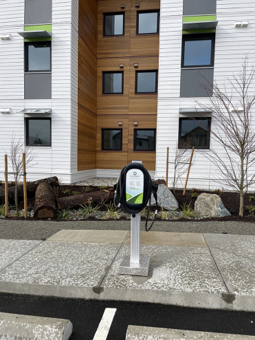 A view of the Maitland with an electric vehicle charging station.