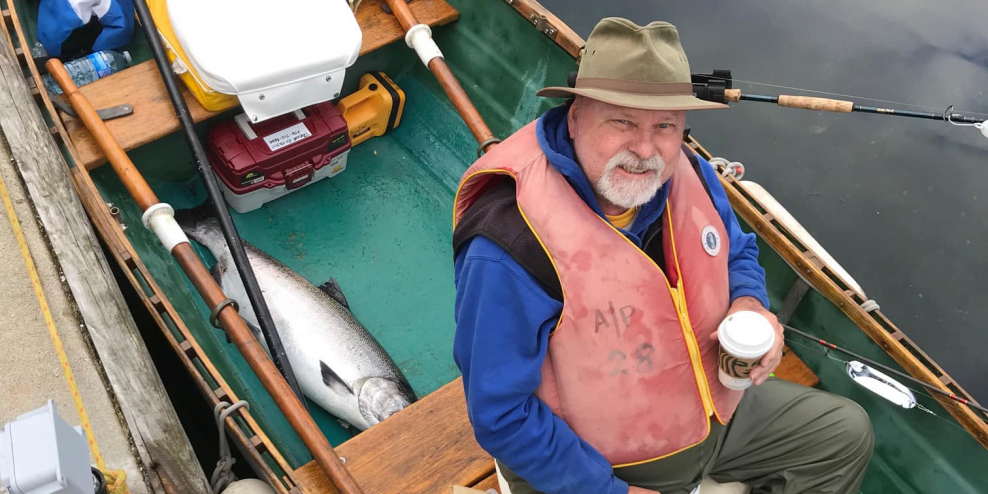 Scott Laird smiles from inside his boat.