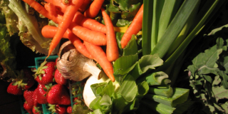 A picture full of fresh, colourful fruits and vegetables.