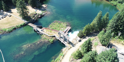 An aerial shot of the Puntledge Diversion Dam on a sunny day.